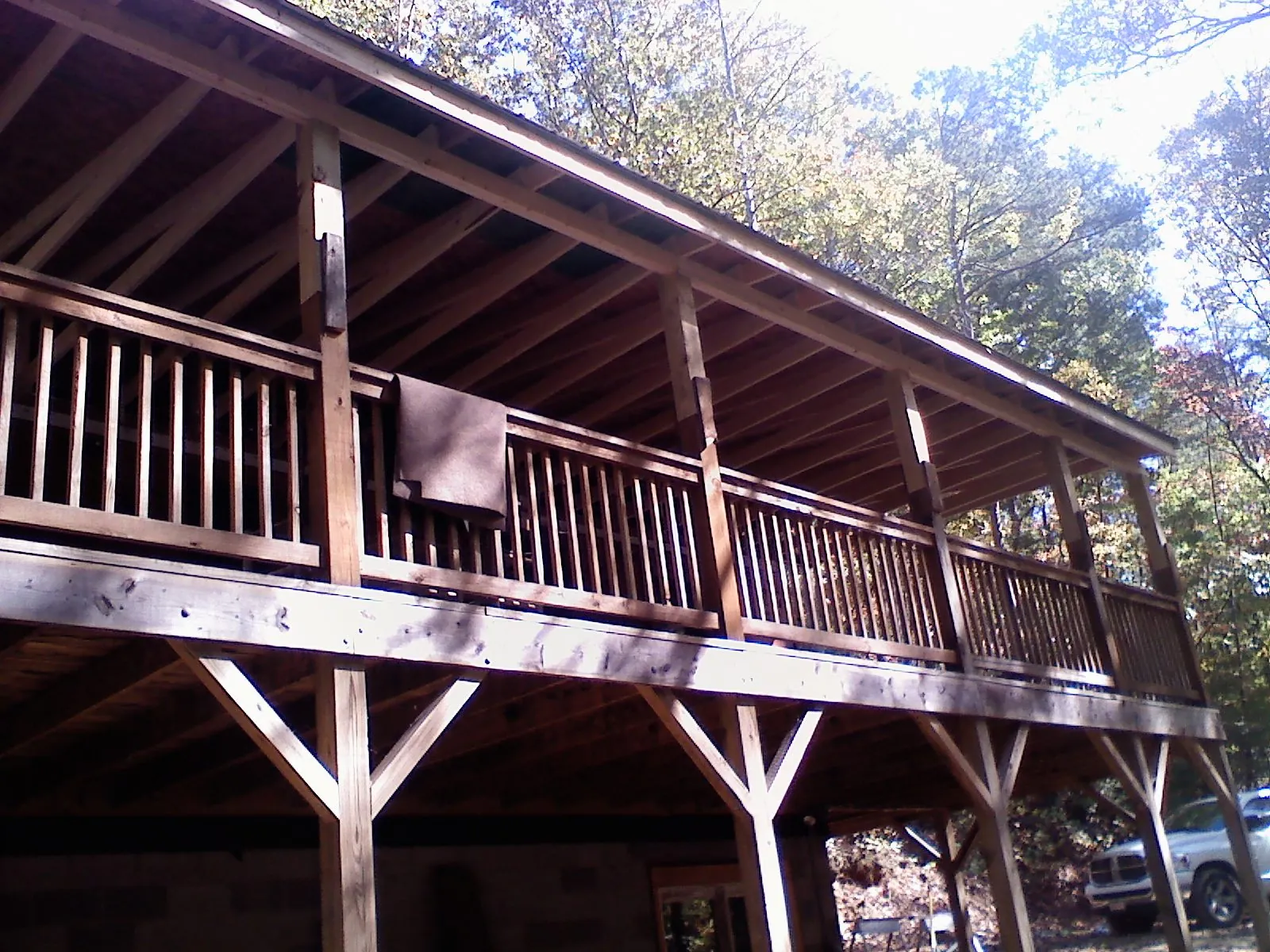 Timber framing under a new elevated porch and deck — Roof Leak Repair in Evans by Roofing Brothers